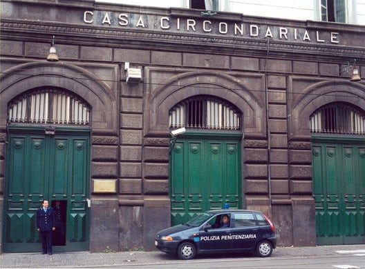The exterior of the prison at Poggioreale, Naples. Inside is 'Room Zero' — an unofficial torture chamber.